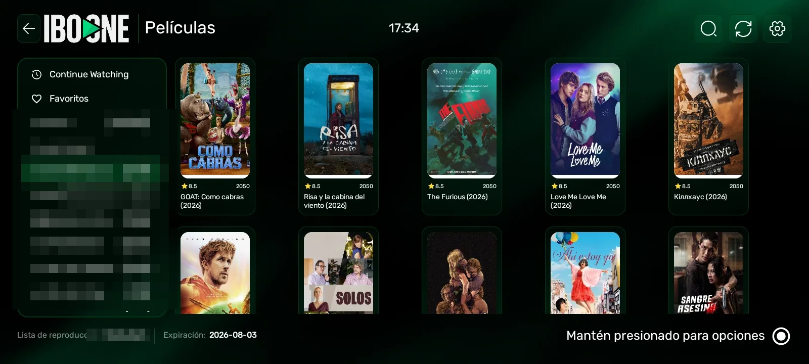 IBO ONE Player - Catálogo de películas en cuadrícula con carátulas y calificación
